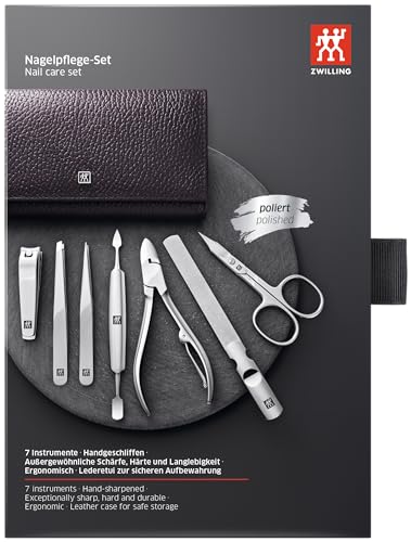 Zwilling Classic Inox 7pc manicure set. Black. Polished Stainless Steel. Set includes nail clipper, nipper, file, pointed & slant tweezers, 2-in-1 combo nail & cuticle scissors, 2-in-1 manicure tool.