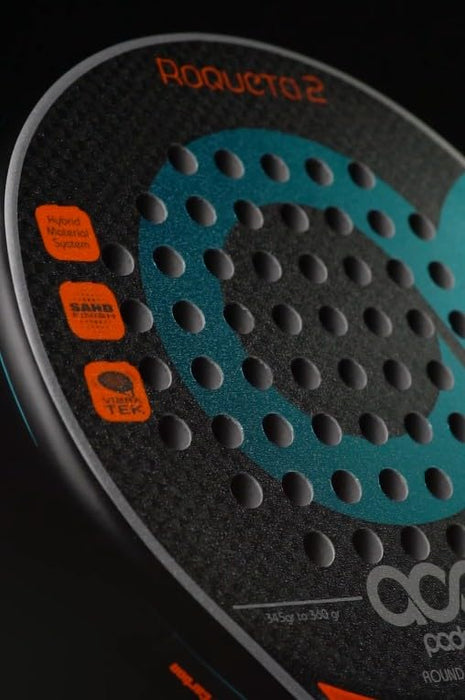 Aca Padel Roqueta 2 (Blue) Face Material Fiberglass, Round Shape, Carbon Frame, Facial Finish Sand, Soft Blackeva Rubber.