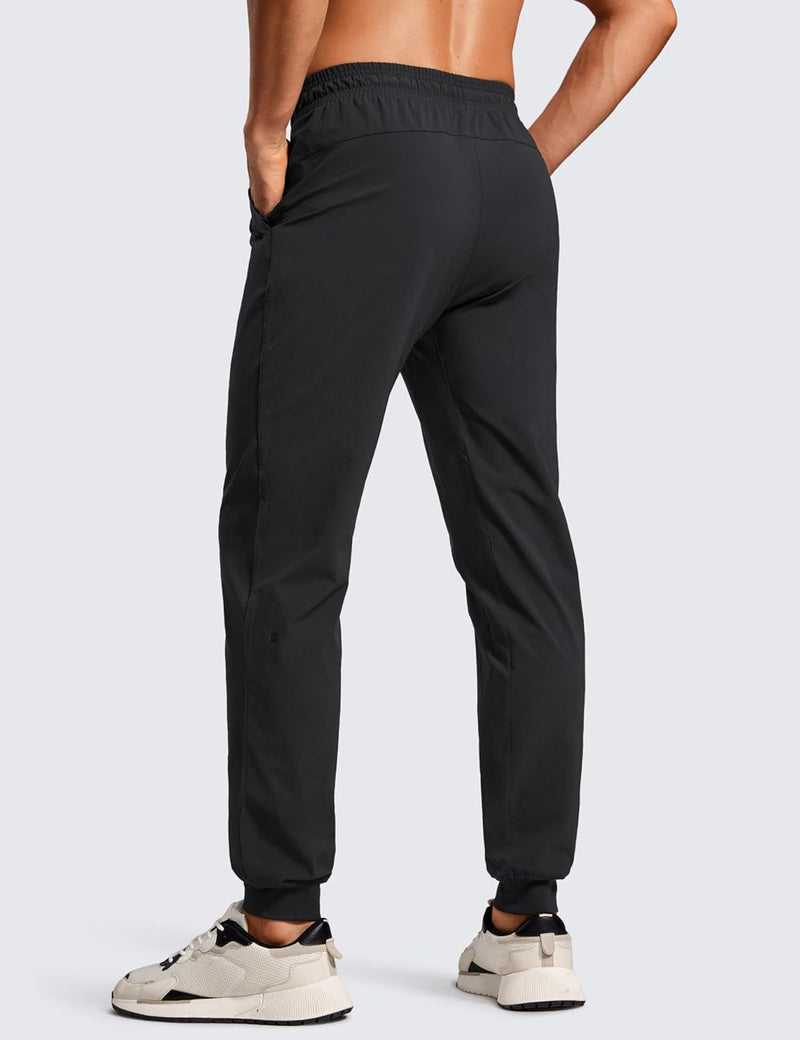 CRZ YOGA Athletic Joggers for Men 29 inch Lightweight Water Resistant Outdoor Workout Pants with Zip Pockets
