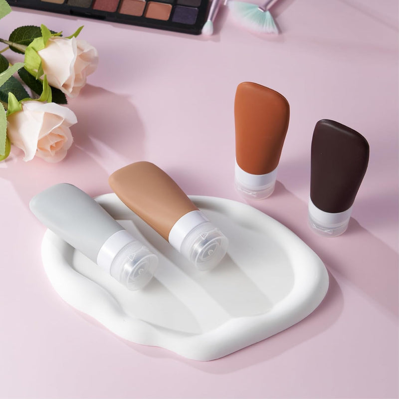 INSFIT Portable Travel Bottles, INSFIT TSA Carry On Approved Toiletries Containers, 60ml Leak Proof Squeezable Silicone Tubes, Refillable Travel Accessories for Shampoo Body Wash Liquids 4 PacK