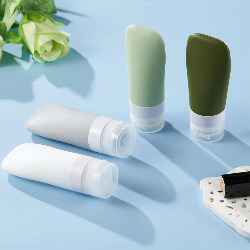 INSFIT Portable Travel Bottles, INSFIT TSA Carry On Approved Toiletries Containers, 60ml Leak Proof Squeezable Silicone Tubes, Refillable Travel Accessories for Shampoo Body Wash Liquids 4 PacK