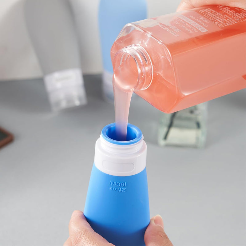 INSFIT Portable Travel Bottles, INSFIT TSA Carry On Approved Toiletries Containers, 60ml Leak Proof Squeezable Silicone Tubes, Refillable Travel Accessories for Shampoo Body Wash Liquids 4 PacK