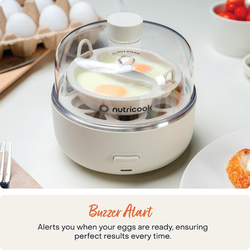 NutriCook Rapid Egg Cooker: 7 Egg Capacity Electric Egg Cooker for Boiled Eggs, Poached Eggs, Scrambled Eggs, or Omelettes with Auto Shut Off Feature - Silver