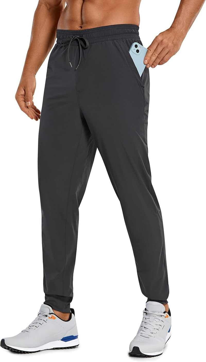 CRZ YOGA Athletic Joggers for Men 29 inch Lightweight Water Resistant Outdoor Workout Pants with Zip Pockets