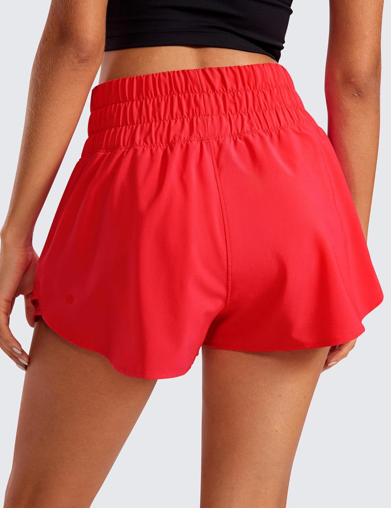 CRZ YOGA Women's High Waisted Flowy Athletic Shorts Ruffle Skirt Wrap Front Liner Workout Running Shorts with Zip Pocket