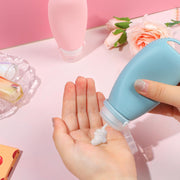 Silicone Travel Bottles for Toiletries, 3oz Travel Toiletry Bottles With Brush Leak Proof Strap, BPA Free Leak Proof Squeezable, TSA Approved for Shampoo Conditioner 2 Pieces, Pink & Blue