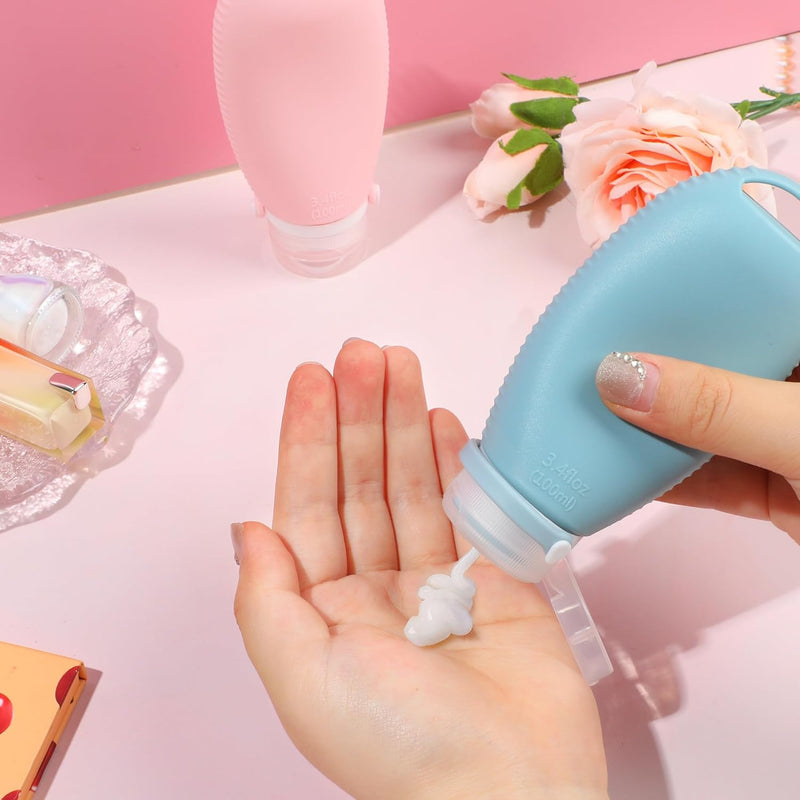 Silicone Travel Bottles for Toiletries, 3oz Travel Toiletry Bottles With Brush Leak Proof Strap, BPA Free Leak Proof Squeezable, TSA Approved for Shampoo Conditioner 2 Pieces, Pink & Blue