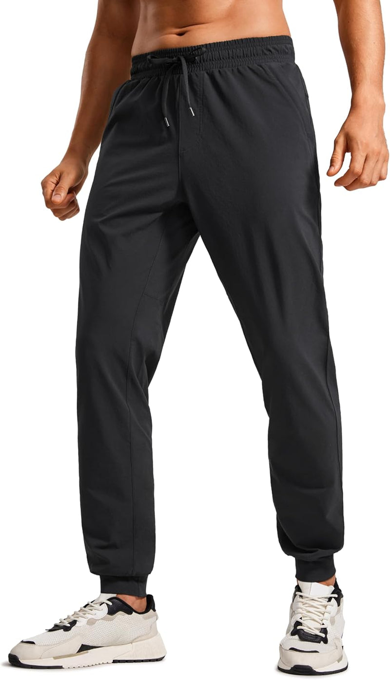 CRZ YOGA Athletic Joggers for Men 29 inch Lightweight Water Resistant Outdoor Workout Pants with Zip Pockets