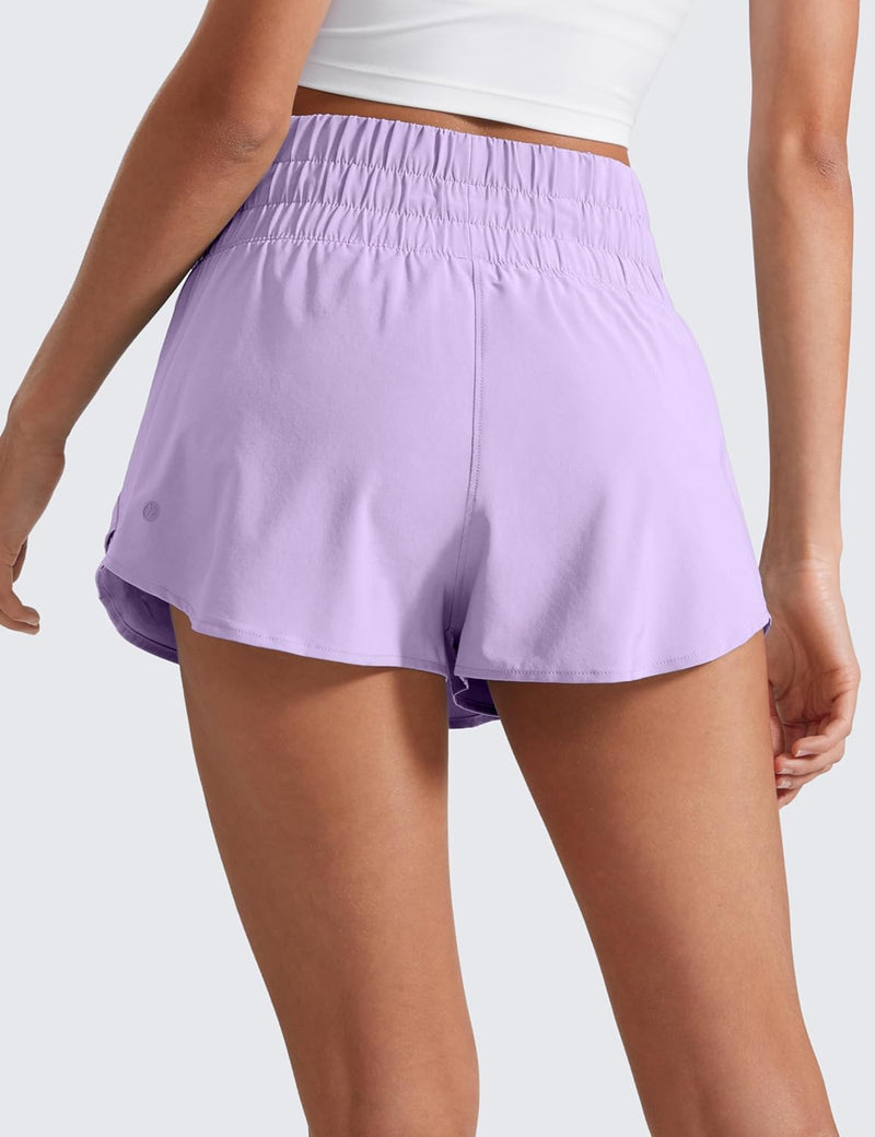 CRZ YOGA Women's High Waisted Flowy Athletic Shorts Ruffle Skirt Wrap Front Liner Workout Running Shorts with Zip Pocket