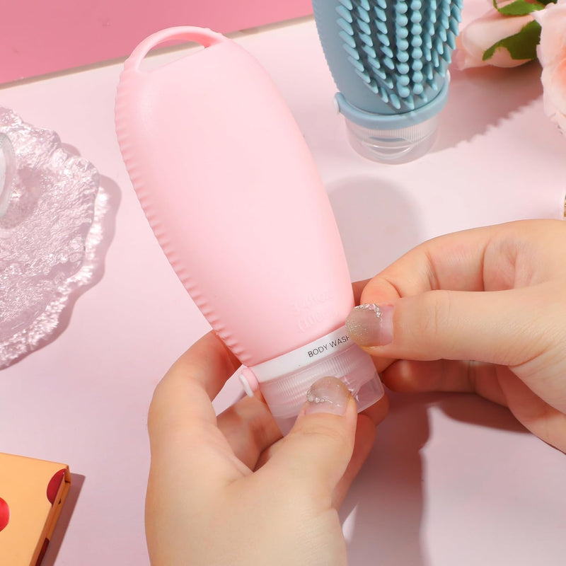 Silicone Travel Bottles for Toiletries, 3oz Travel Toiletry Bottles With Brush Leak Proof Strap, BPA Free Leak Proof Squeezable, TSA Approved for Shampoo Conditioner 2 Pieces, Pink & Blue
