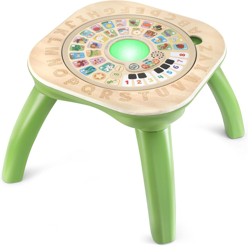 LeapFrog ABCs and Activities Wooden Table Educational play table with letters, numbers, and sensory activities that help toddlers build fine motor skills and early literacy knowledge.