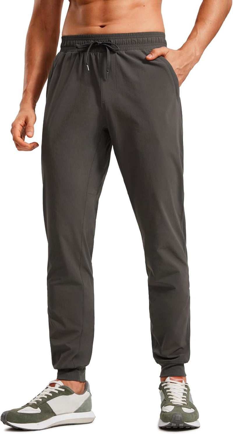 CRZ YOGA Athletic Joggers for Men 29 inch Lightweight Water Resistant Outdoor Workout Pants with Zip Pockets