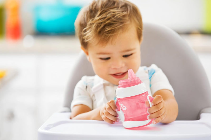 Munchkin Gentle Transition Trainer Cup, Spout transition from bottle to spill proof cup, leak proof and anti-slip handle for Baby/infant, boys and girls, 4oz Cpacity,4 months and above, Pink