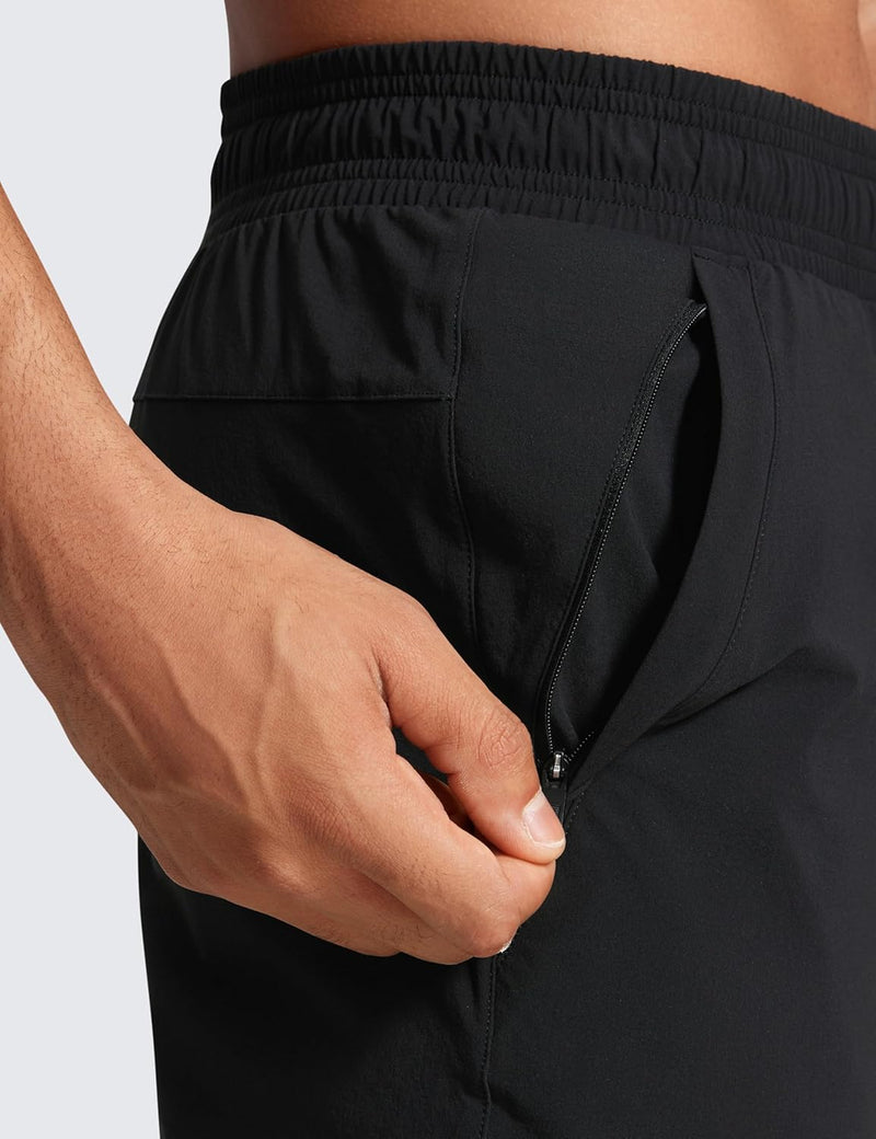 CRZ YOGA Athletic Joggers for Men 29 inch Lightweight Water Resistant Outdoor Workout Pants with Zip Pockets