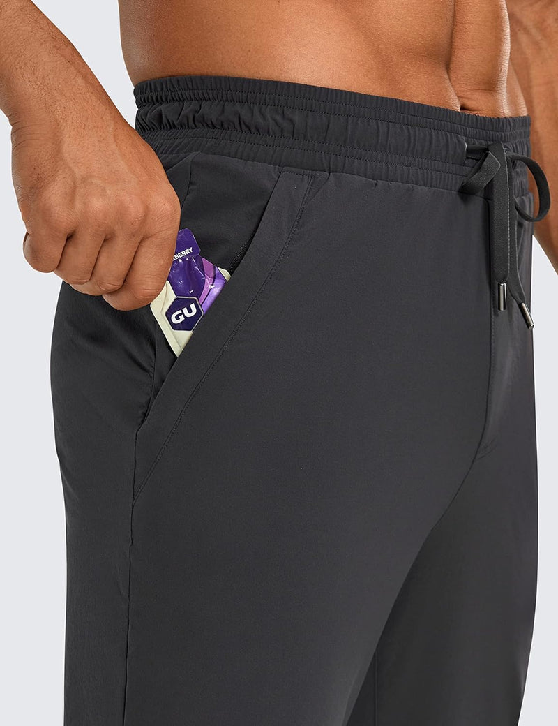 CRZ YOGA Athletic Joggers for Men 29 inch Lightweight Water Resistant Outdoor Workout Pants with Zip Pockets